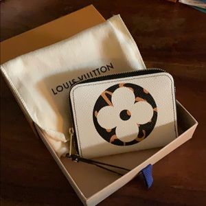 Sold **Louis Vuitton  Jungle collection zippy coin
